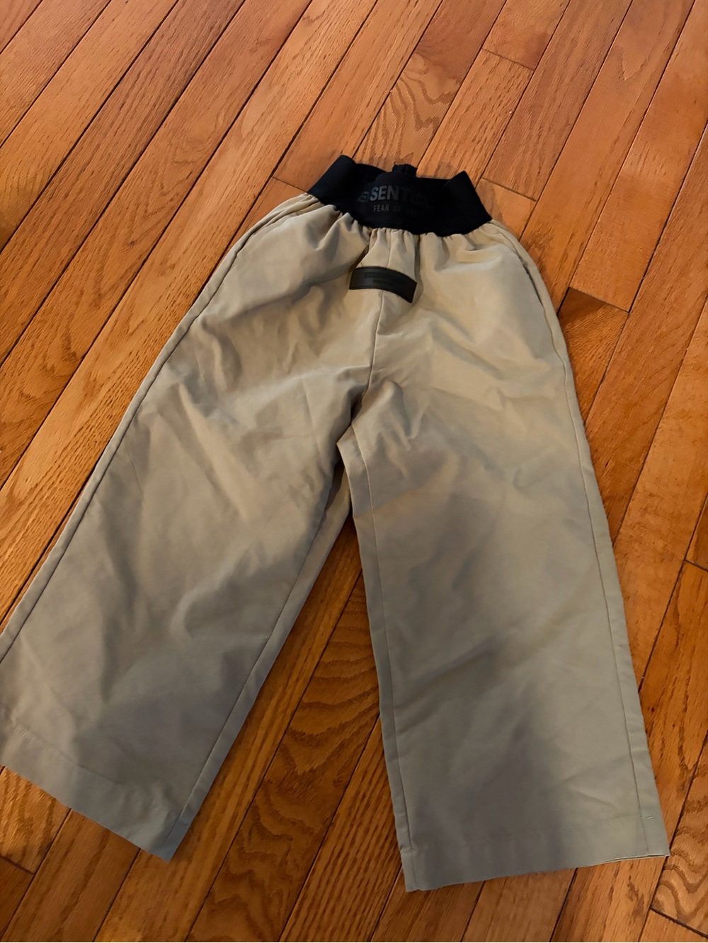 Kids Fear of God Essentials Wide-Leg Chino Pants in Khaki with Elastic Waistband